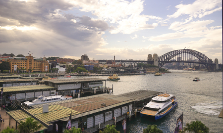 Circular quay wharf with the view of Sydney harbour bridge and opera house in background, which the most famous landmarks of the world.のeditorial素材