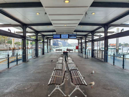 Empty ferry wharf dock at Circular quay in Sydney is quiet and empty with people during covid 19...