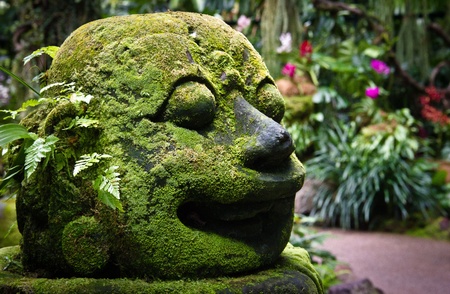 Moss covered stone rock carvingの写真素材