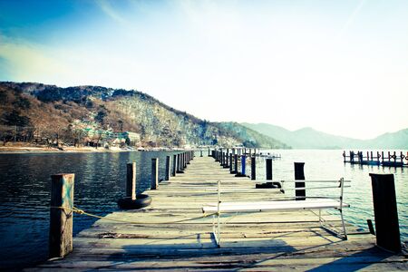 The small dock that is on the lake in the afternoonの写真素材