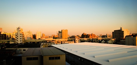 A skyline of an urban town during sunrise