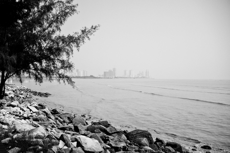 The rocky beach of Penang Malaysia during low tideの写真素材