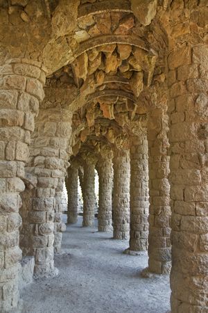 Public Park Guell from Barcelona showing some stone archs and columns from below. from the famous architect Gaudi from 1930sの写真素材