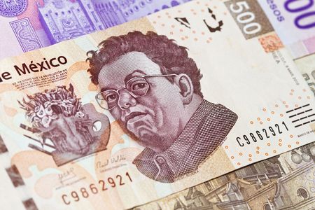 New 500 peso mexican bill closeup showing Diego Rivera the painter. This is the newest bill as of 2010 on the Mexican currency. Other bills above and below.の写真素材