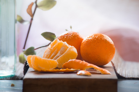 Natural and fresh Tangerine slices on natural morning backgroundの写真素材