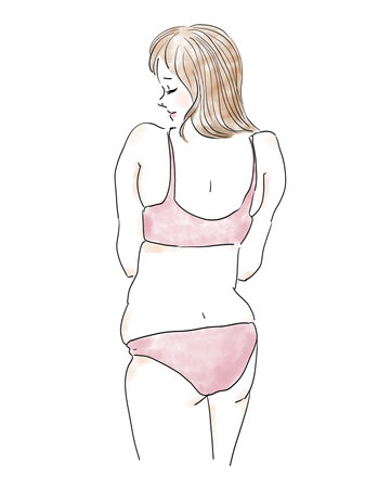 Pretty woman who cares about being fatの写真素材