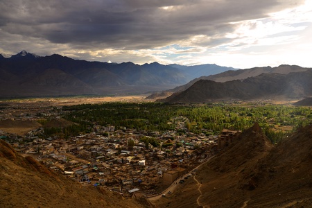 Beautiful scenic view of Leh city at summer time evening with distant colorful mountain and cloudy sky, Ladakh range, Jammu   Kashmir, Northern Indiaの写真素材