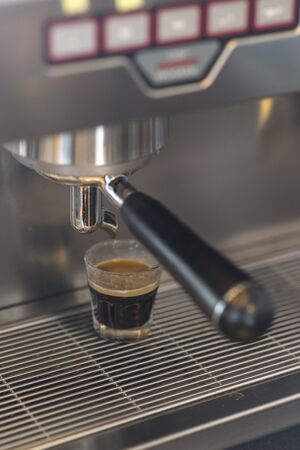 Espresso machine brewing hot espressoの写真素材