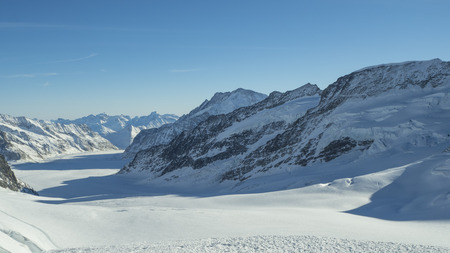 Jungfraujoch glacier snowcapped mountain range.の写真素材
