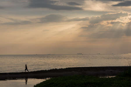 Tropical beach in sunset timeの写真素材