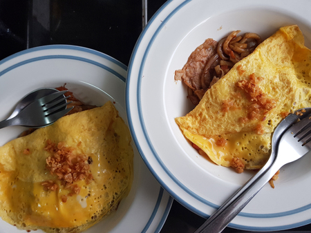 Fried egg with rice and porkの写真素材