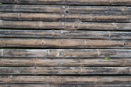 Old bamboo texture arrange in horizontal pattern for backgroundの写真素材