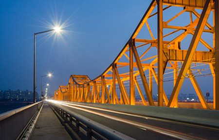 Late night traffic blurs past Bridge at Night in Seoul,South Korea (long exposure)の写真素材