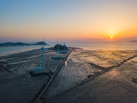 Aerial view Sunset of wind turbine in Daebudo Island,South Korea.の写真素材
