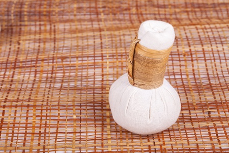 Spa and wellness setting with natural soap, candles and towelの写真素材