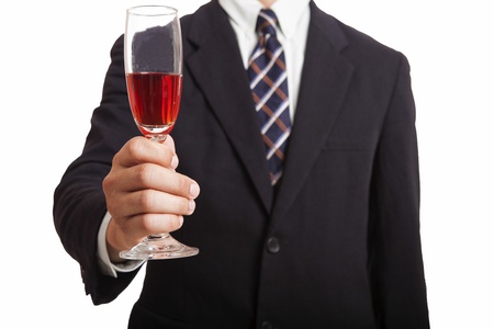 Businessman holding wineの写真素材
