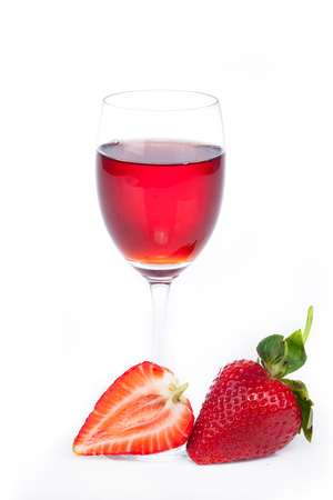 Water strawberry berries in a glass on a white background.の写真素材