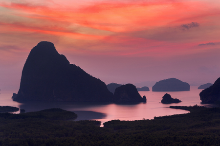 Dramatic sunrise over the mountains and the sea  in Thailand.の写真素材