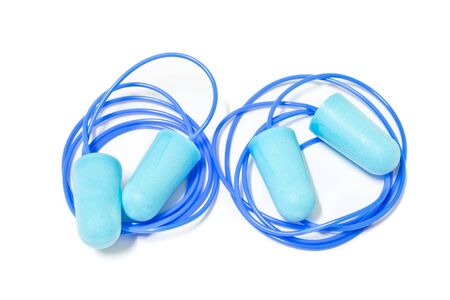 blue ear plugs on white background