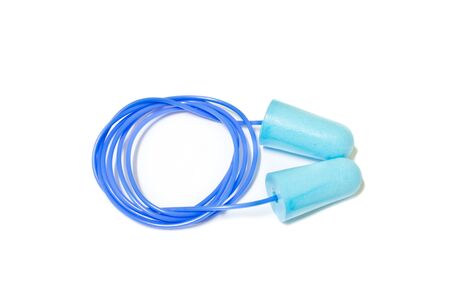 blue ear plugs on white backgroundの写真素材