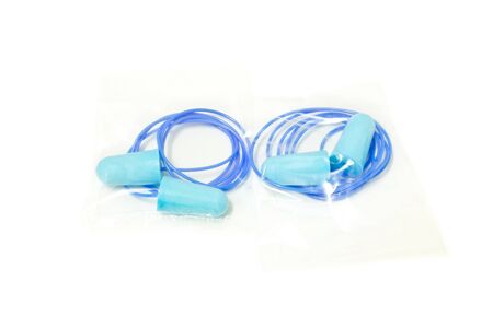 blue ear plugs in package on white background