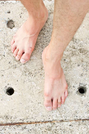 Foot on concrete backgroundの写真素材