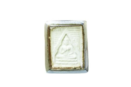 old amulet isolated on whiteの写真素材