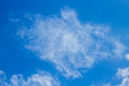 blue sky background with cloudsの写真素材
