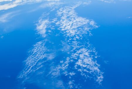 blue sky background with cloudsの写真素材