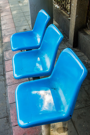 Plastic Seat, Blue chair at bus stopの写真素材