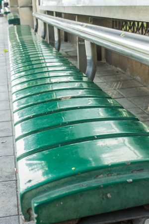 Plastic Seat, Green chair at bus stopの写真素材