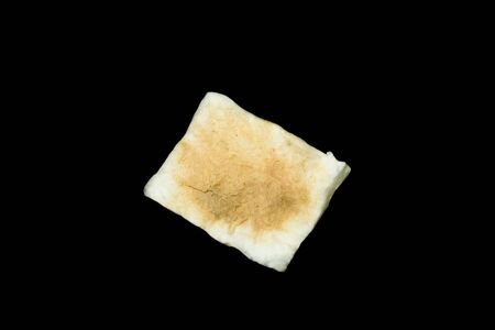 Makeup cleaning, Dirty cotton pads isolated on black backgroundの写真素材