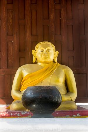 buddha statue in meditation postureの写真素材