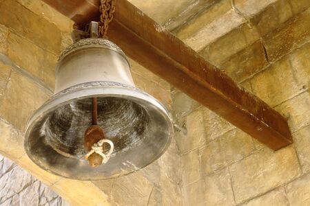 Big bell hanging over the head