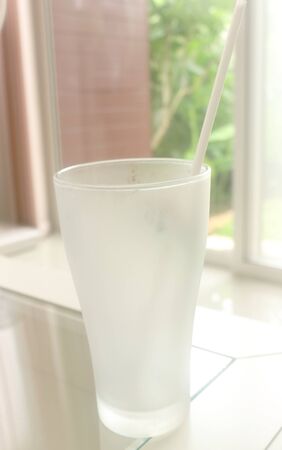 empty glass of water on the tableの写真素材