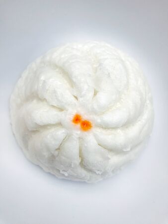 Steamed stuffed bun on white backgroundの写真素材