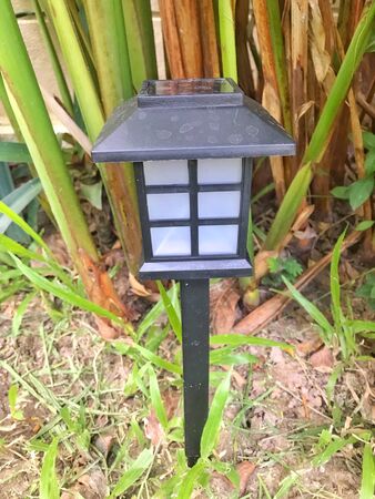 Decorative small solar garden light, Lantern in the gardenの写真素材