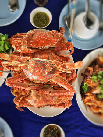 Cooked steamed crab on white plateの写真素材