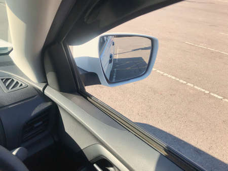 side rear-view mirror on a carの写真素材