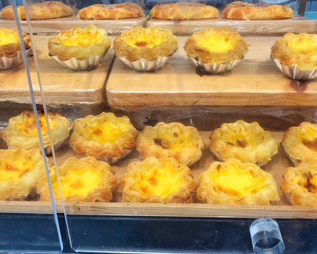 Group of egg tart in bakery shop.