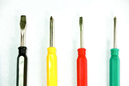 cocourful screw drivers on white scene,shallow focus
