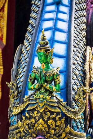 green angel sculpture at Chiangrai temple,Thailandの写真素材