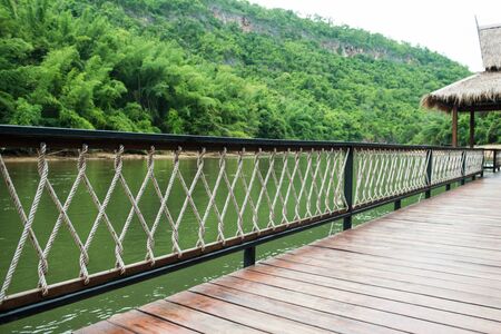 Rope Balustrade with handrail along the wooden walkwayの写真素材
