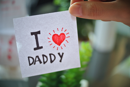 father's day. Happy father's day. family day. children daycare. children days. i love you dad. thank you dad. with flowerの写真素材