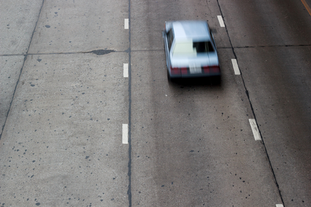 Car Blue classic moving on roadの写真素材