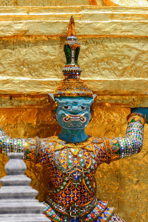Guardian statues in Emerald buddha temple in Bangkok thailandの写真素材