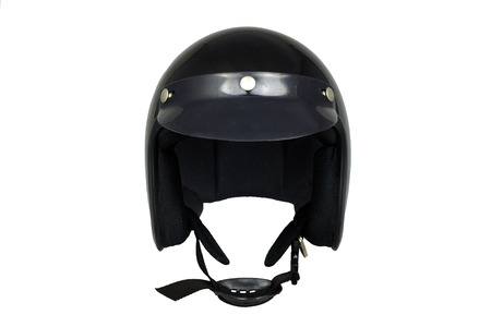 Black motorbike classic helmet isolated on whiteの写真素材