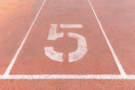 Start track. Lanes 5, number five of a red racing track.の写真素材