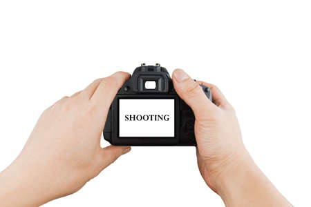 Photographer shooting hands close up isolated on whiteの写真素材