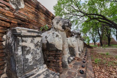 Details of pagoda base at Wat Maheyong, Ancient temple and monument in Ayutthaya province, Thailandの写真素材